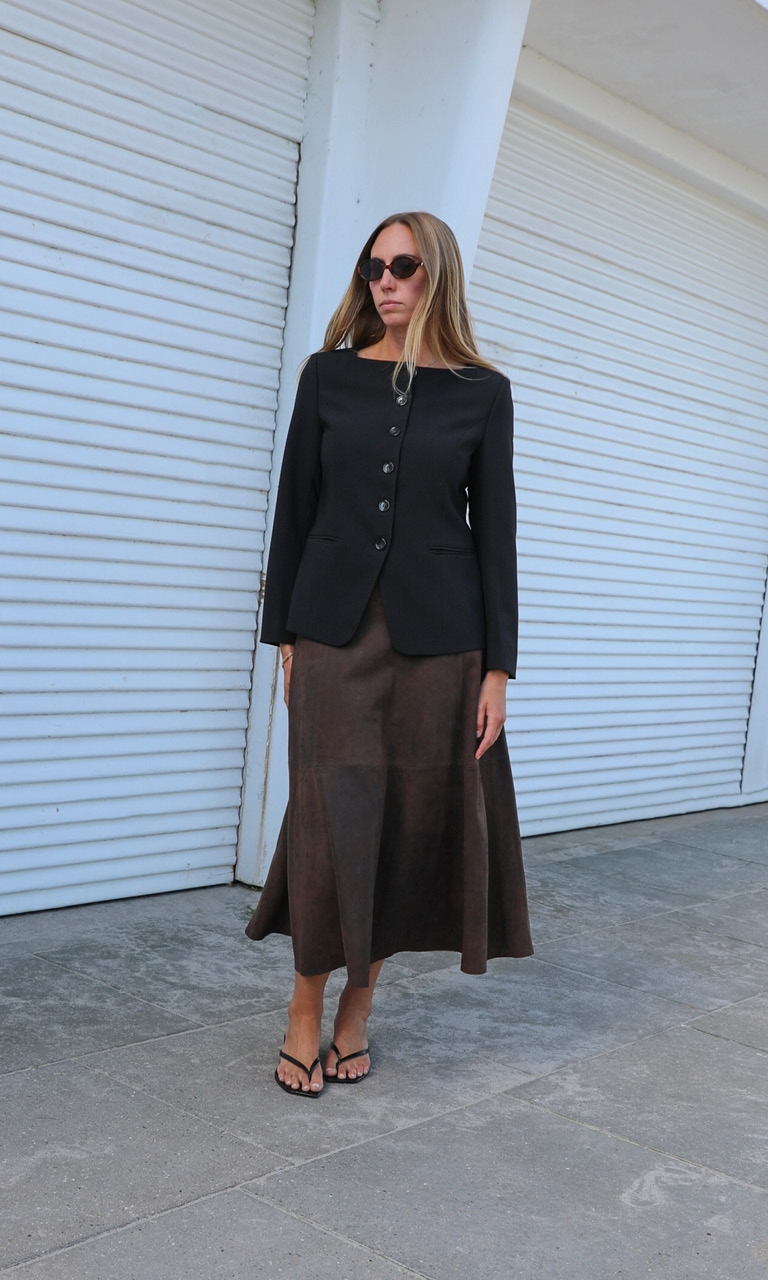 woman in black blazer