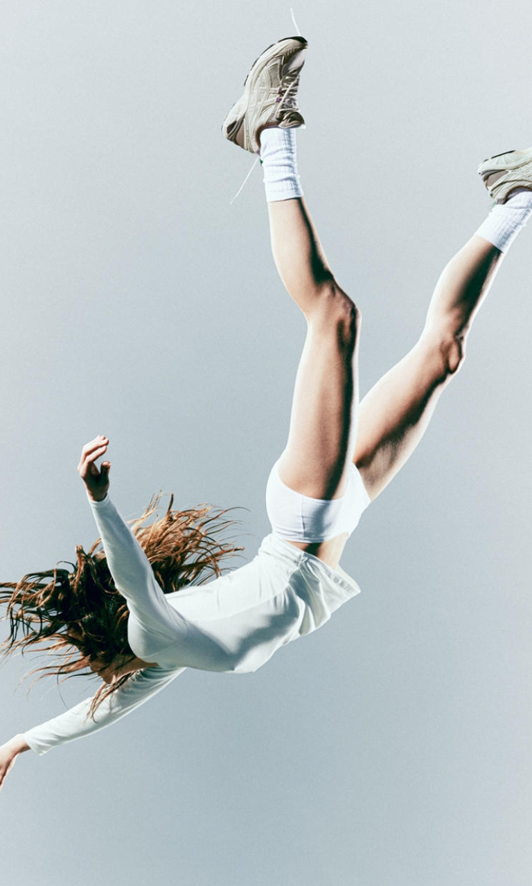 Woman falling in Asics Woodwood GT2160 shoes
